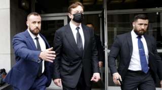 Elon Musk leaves court shortly before the verdict