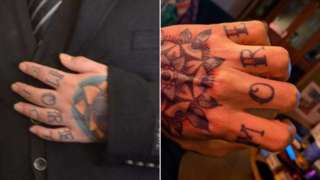 Tattooed hand of an imposter and of Dr Matt Loader's