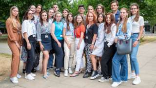 Students from Ukraine standing together outside at the University of Cambridge