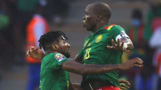 Cameroon striker Vincent Aboubakar (right) celebrates his second goal against Burkina Faso