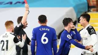 Fulham's Antonee Robinson is sent off by referee Peter Bankes in the game against Chelsea in January