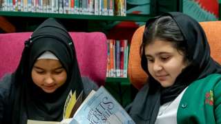 girls reading books