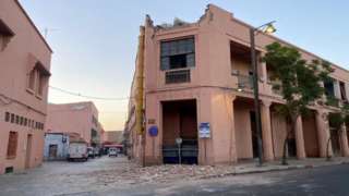 A damaged building in Marrakesh's old city, part of the roof has collapsed onto the street