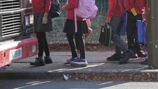 Pupils from Mayflower Primary School in Leicester, which has been affected with sub standard reinforced autoclaved aerated concrete (Raac), are taken by bus to another school with mobile units