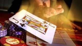 Poker table, chips, playing card