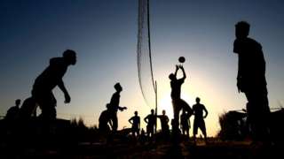 Ethiopian refugees who fled fighting in Tigray province play volleyball at the Um Raquba camp in Sudan's eastern Gedaref province, on November 21, 2020. - Ethiopia's northern Tigray region has been rocked by bloody fighting since November 4, when Ethiopian Prime Minister Abiy Ahmed announced the launch of military operations there. Neighbouring Sudan, itself suffering from a severe economic crisis, was caught off-guard when the conflict broke out earlier this month. It now hosts some 36,000 Ethiopians, with many in transit camps near the border, according to Sudan's refugee commission.
