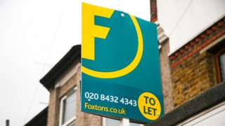 newspaper article on business Foxtons sign
