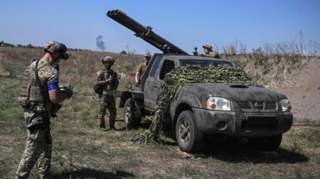 Ukrainian servicemen of the 108th Separate Brigade of Territorial Defence prepare a small multiple launch rocket system for firing toward Russian troops, amid Russia's attack on Ukraine, near a front line in Zaporizhzhia region, Ukraine August 19, 2023. REUTERS