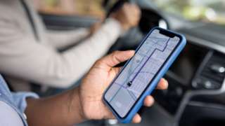 man using gps on mobile phone