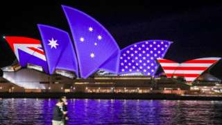 The American and Australian flags projected onto the sails of the Sydney Opera House on 1 September 2021 to mark the 70th anniversary of the Anzus security alliance