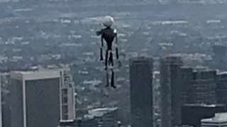 A police helicopter captured an inflatable Halloween decoration floating over LA