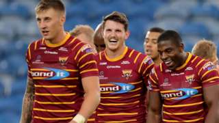 Huddersfield celebrate a try