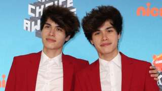 YouTube personalities Alan and Alex Stokes at an award ceremony.