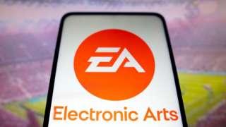 EA logo against background of a football pitch