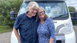 Robert and Debbie Woodhouse with their motorhome