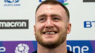 Stuart Hogg smiles as he speaks to the media on Monday