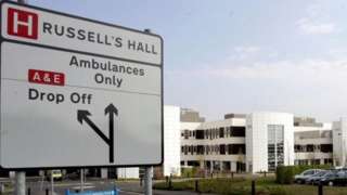 A sign in front of Russells Hall Hospital