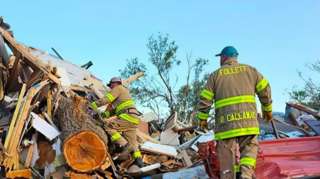 A handout photo made available by the Booker Fire Department shows the damages of an overnight tornado that has reportedly killed at least three people and injured dozens of others in Perryton, Texas