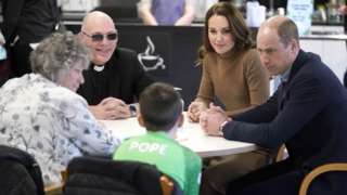 The Duke and Duchess of Cambridge (right) meet Carole Ellis and her great grandson Deacon Glover,11, whose mother, Grace Taylor has passed away, during a visit to charity, Church on the Street, in Burnley, Lancashire, where they met with volunteers and staff as well as a number of service users to hear about their experiences first-hand.