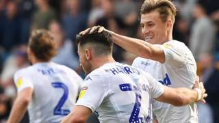 Leeds celebrate Jack Harrison's goal at Millwall