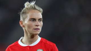 Jess Fishlock was awarded an MBE for services to women's football and the LGBT community