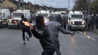Youths with petrol bombs