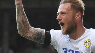 Liam Cooper celebrates Leeds' third goal