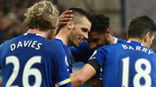 Everton's players celebrate Morgan Schneiderlin's goal against West Brom