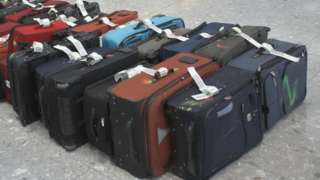Lots of bags at Heathrow Airport