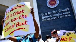 Protestors outside the Central Bank of Sri Lanka front office in Colombo.