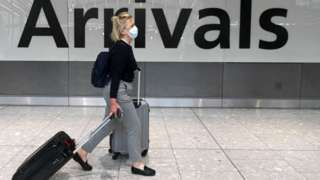 Woman arriving at Heathrow