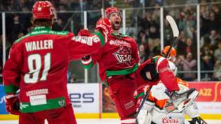 Josh Brittain celebrates his second period power play goal for Cardiff Devils
