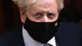 Prime Minister Boris Johnson leaves 10 Downing Street, London, to attend Prime Minister's Questions, 12 January 2022