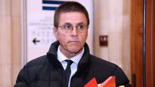 Hassan Diab who was arrested in November 2008 for his alleged role in a 1980 Paris synagogue bombing arrives at the courthouse on Mai 24, 2016 in Paris