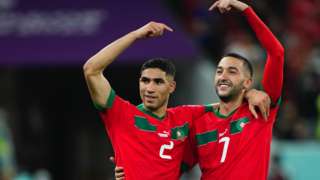 Achraf Hakimi and Hakim Ziyech celebrate a Morocco win at the World Cup