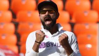 Virat Kohli celebrates a wicket