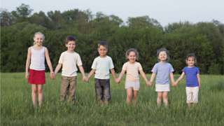 Boys and girls in height order