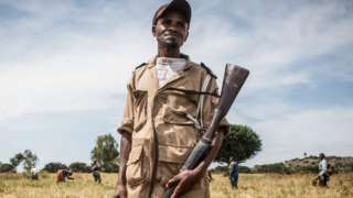 Man holding a gun