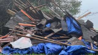 A pile of fly-tipped waste on Wiltshire farmland