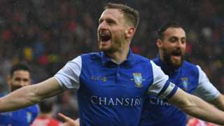 Tom Lees runs with his arms outstretched in celebration after restoring Sheffield Wednesday's lead at Sunderland