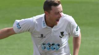 Ollie Robinson celebrates a wicket for Sussex