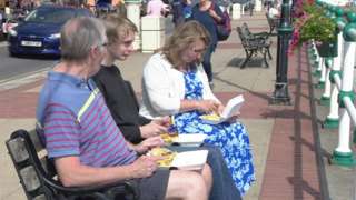 Family eating chips in Penarth