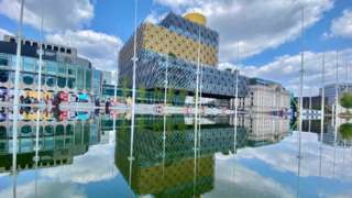 The Library of Birmingham reflected in water