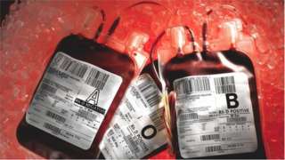Full packages of donated blood sit on ice