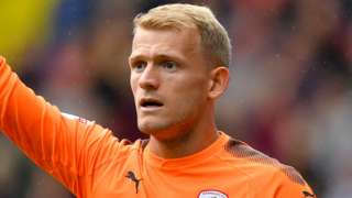 Barnsley keeper Adam Davies