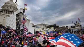 Trump supporters clash with police and security forces as people try to storm the US Capitol on January 6, 2021 in Washington, DC