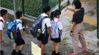Children going to school in Singapore