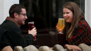 People drinking outside