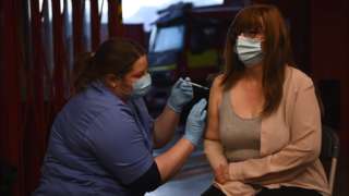 Woman receiving injection