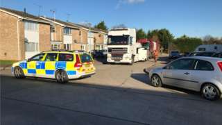 Bin lorry being towed away